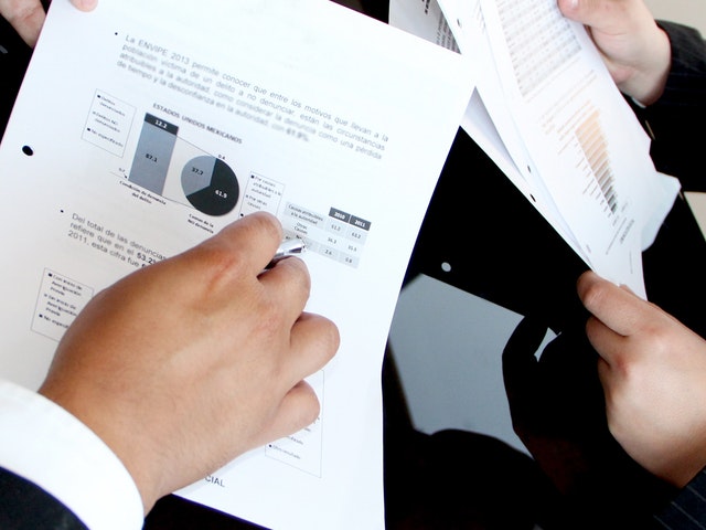 Photo of papers with charts